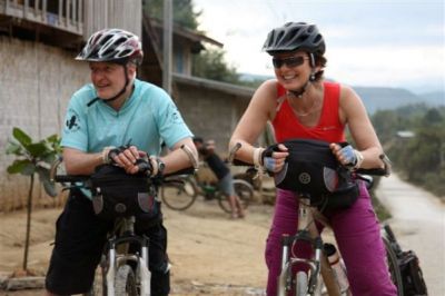 Michele McCoy and Malcolm Dean Cycling on the  tour with redspokes